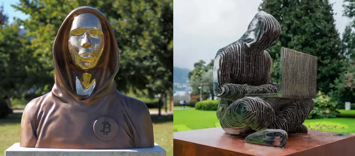 Two artistic sculptures representing Satoshi Nakamoto, featuring unique and abstract designs.